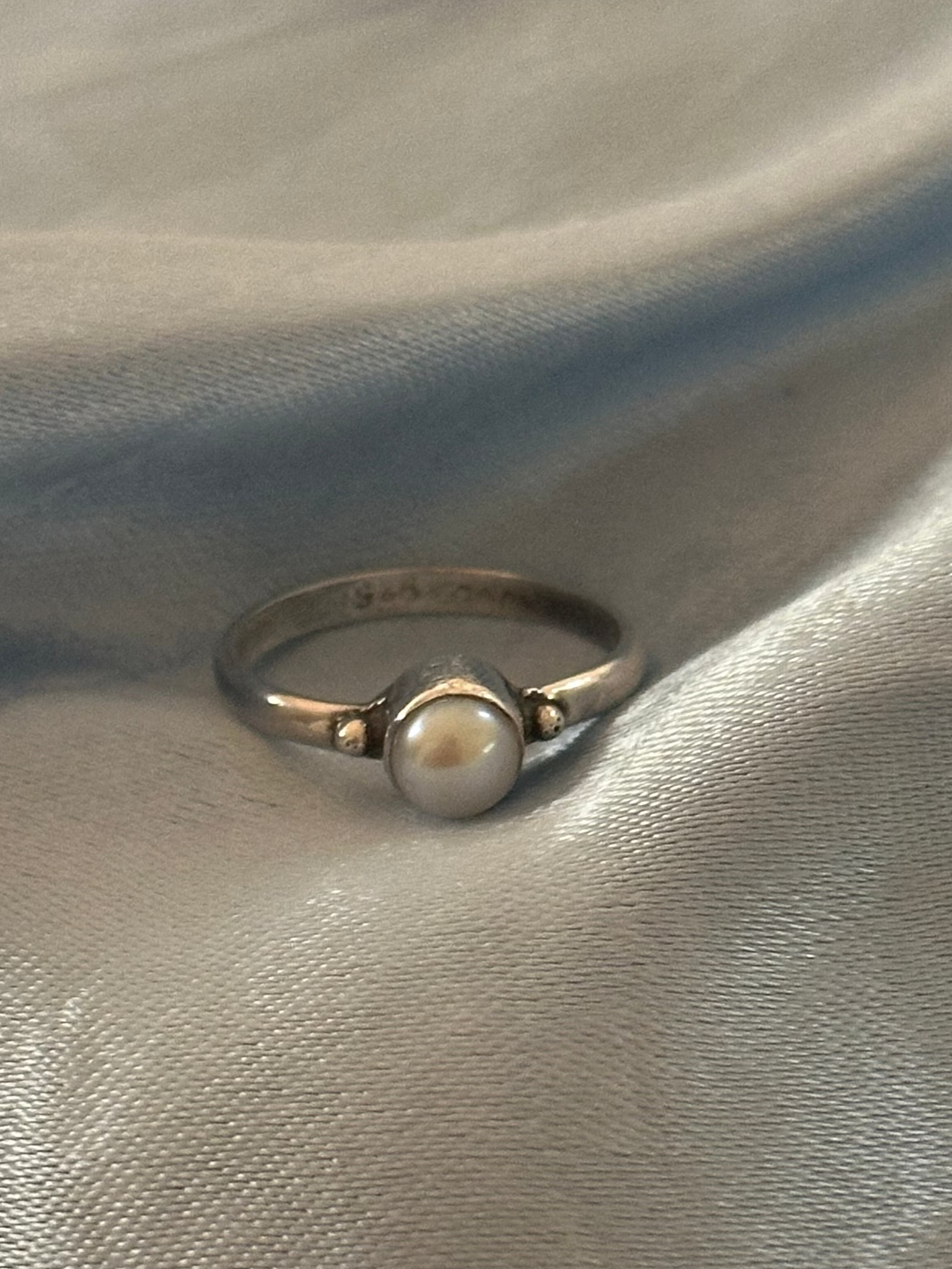 Pearl and silver ring