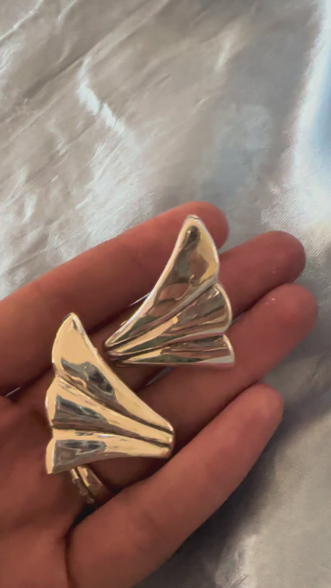 Silver wing clip on earrings